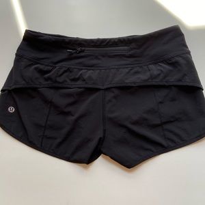 black Lululemon speed shorts, size 4